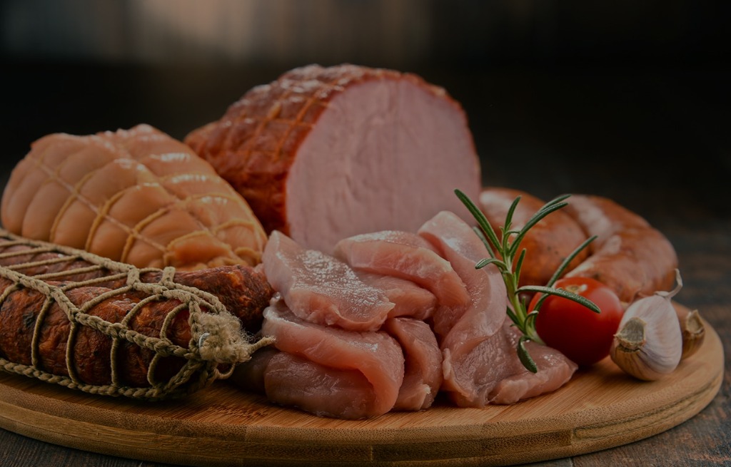 Premium cuts of meat on a preparation surface